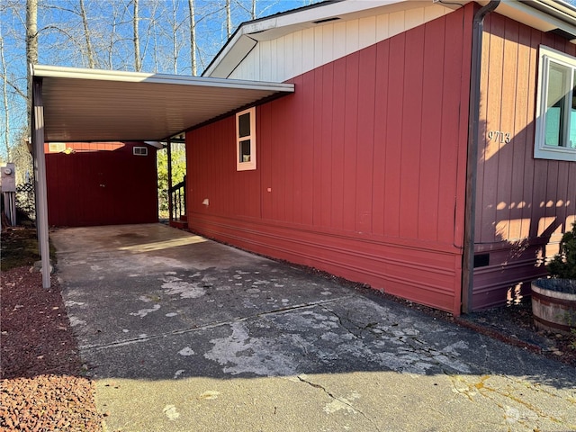 view of home's exterior with a carport