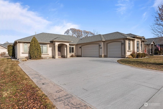 ranch-style home with a garage