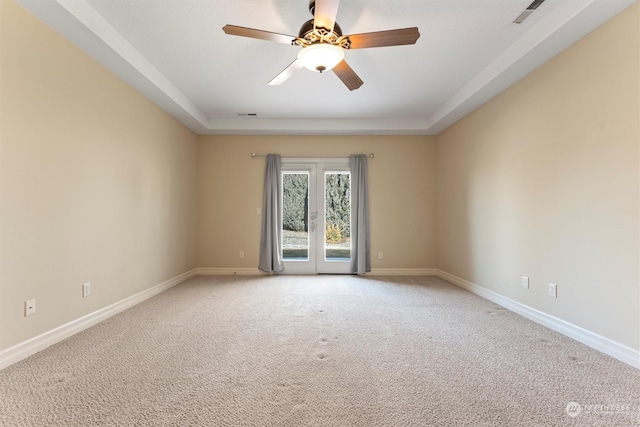 empty room with light carpet and ceiling fan