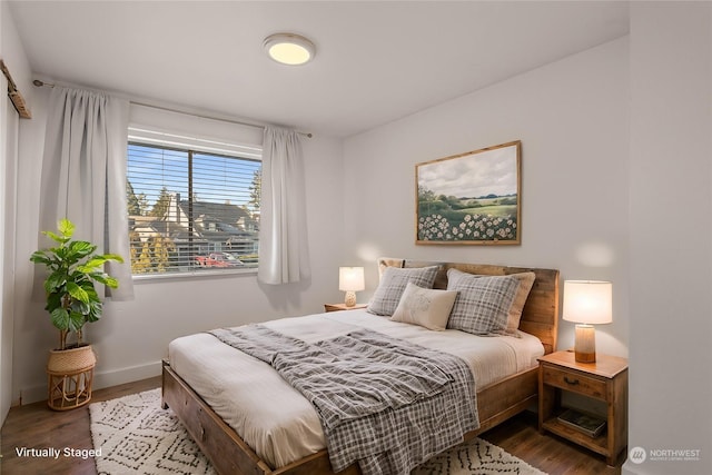 bedroom featuring hardwood / wood-style flooring