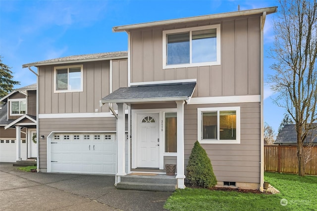 view of front of home with a garage