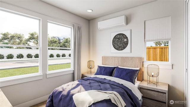 bedroom with a wall unit AC