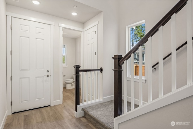 foyer with light wood-type flooring