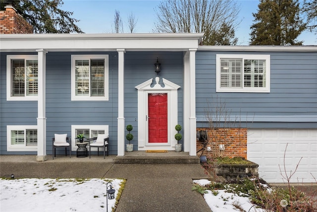 entrance to property with a garage