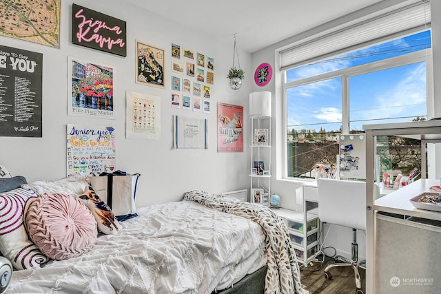 bedroom featuring wood-type flooring