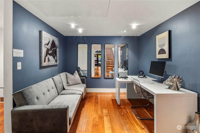 office space with hardwood / wood-style flooring