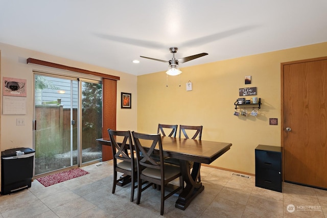 dining room featuring light tile patterned floors and ceiling fan