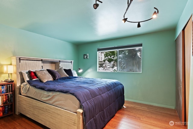 bedroom featuring hardwood / wood-style floors