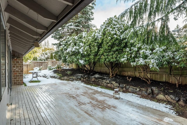 view of snow covered deck