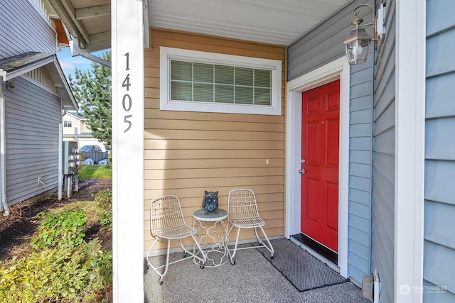 property entrance with covered porch