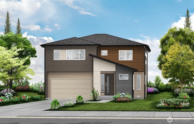 view of front of home featuring a garage and a front yard