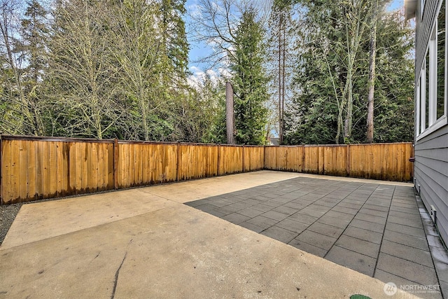 view of patio with a fenced backyard