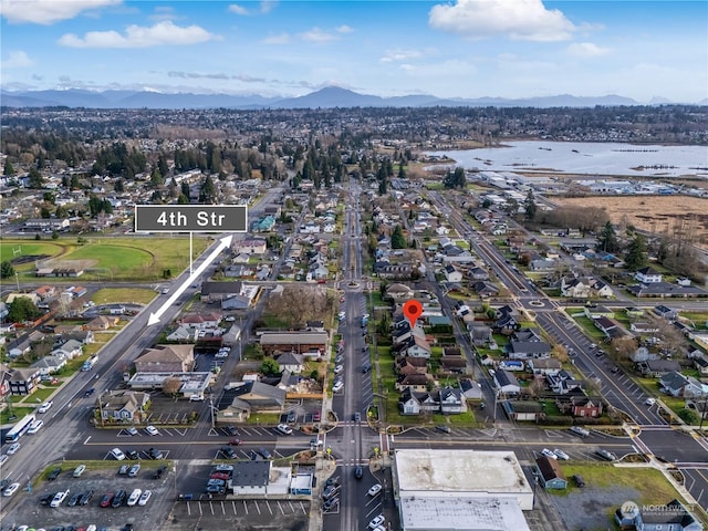 bird's eye view featuring a water and mountain view