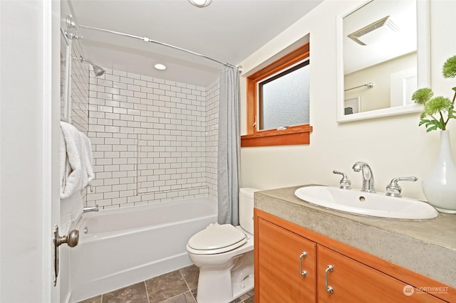 full bathroom with vanity, toilet, and shower / tub combo