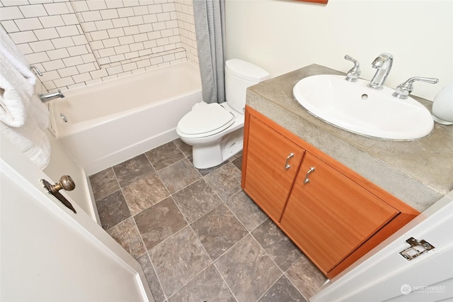 full bathroom with shower / bath combination with curtain, vanity, and toilet