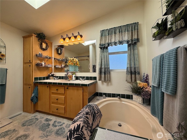 full bathroom with a sink, visible vents, a shower, a bath, and double vanity