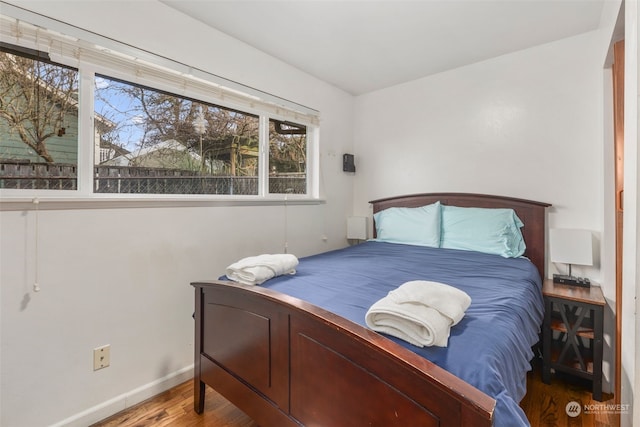 bedroom featuring hardwood / wood-style floors