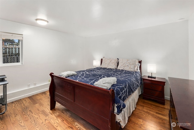 bedroom featuring hardwood / wood-style flooring