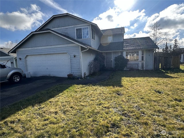 front facade featuring a garage and a front yard