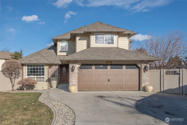 view of front of property with a garage