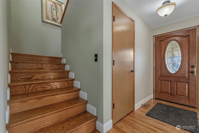 foyer entrance featuring light wood-type flooring