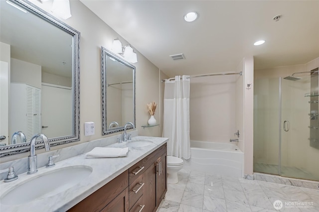 full bathroom featuring toilet, vanity, and shower / bath combo with shower curtain