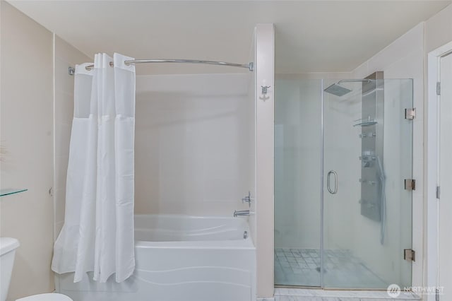 bathroom with shower with separate bathtub and toilet