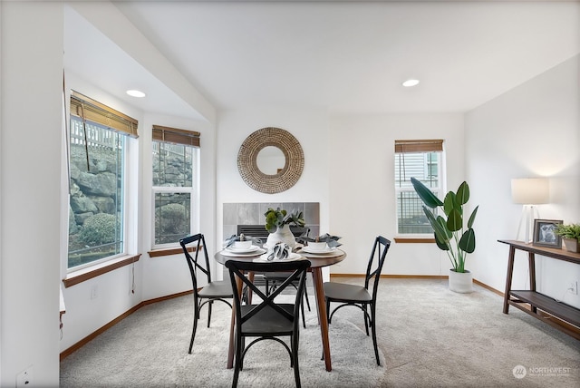 dining area featuring carpet floors