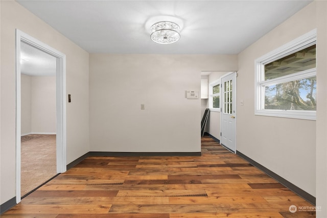 corridor with dark wood-type flooring