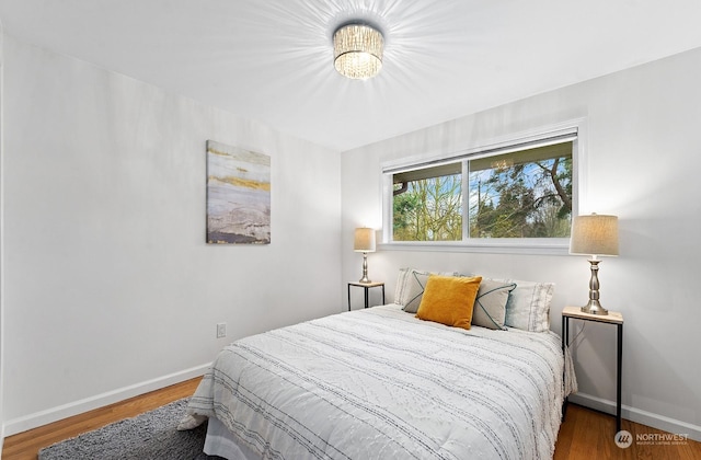 bedroom featuring wood-type flooring