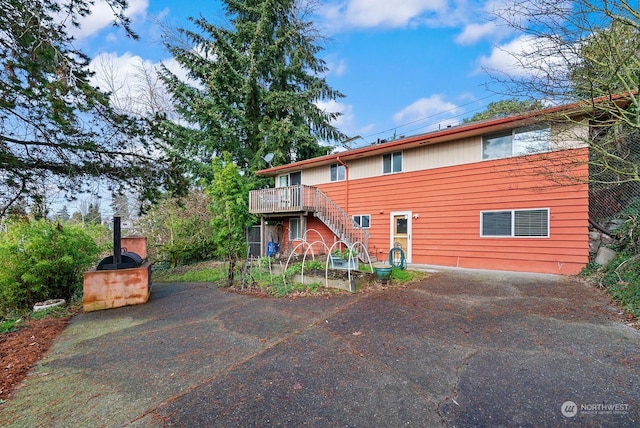 view of front of property featuring a deck