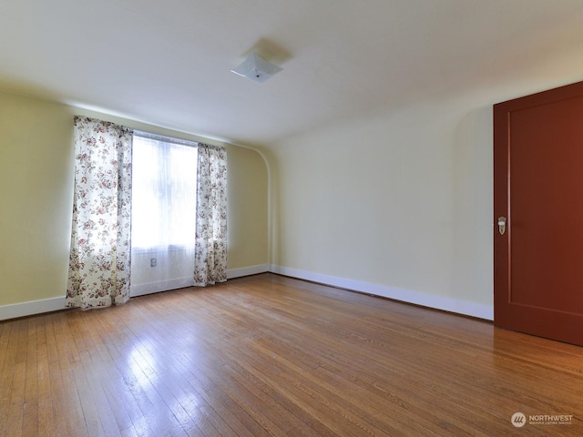 unfurnished room featuring light hardwood / wood-style floors