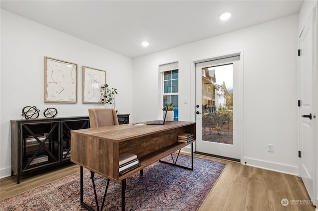 office space featuring light hardwood / wood-style floors