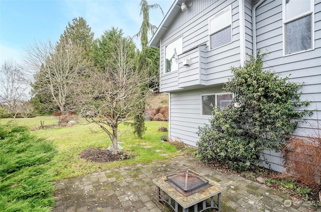 view of patio / terrace with a fire pit