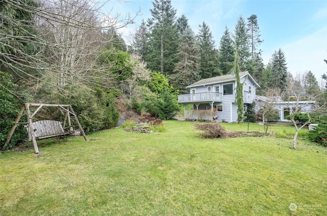 view of yard with a deck