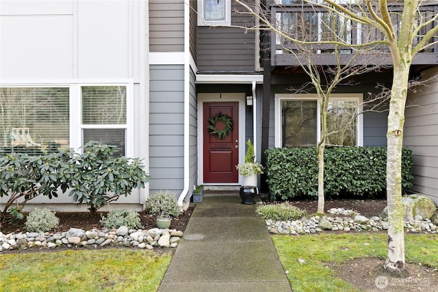 property entrance with a balcony