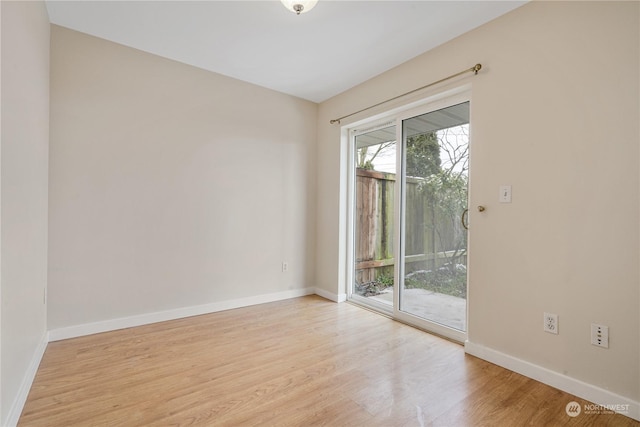 unfurnished room featuring light hardwood / wood-style floors