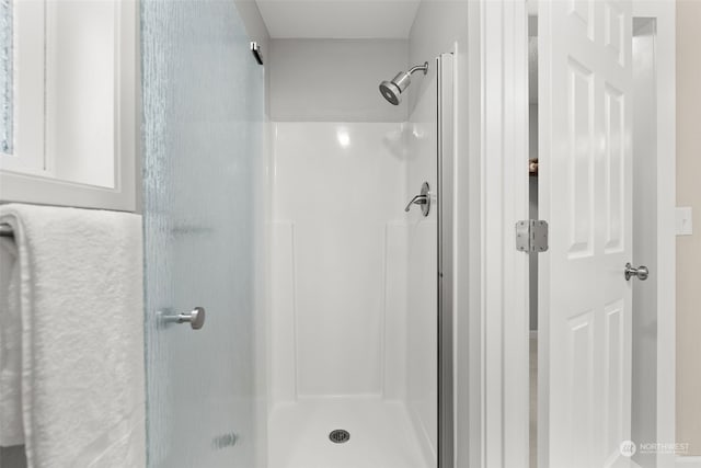 bathroom with walk in shower