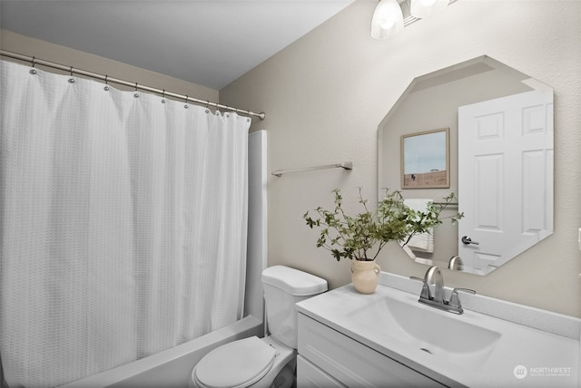 full bathroom with vanity, toilet, and shower / bath combo with shower curtain