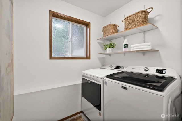 clothes washing area with independent washer and dryer