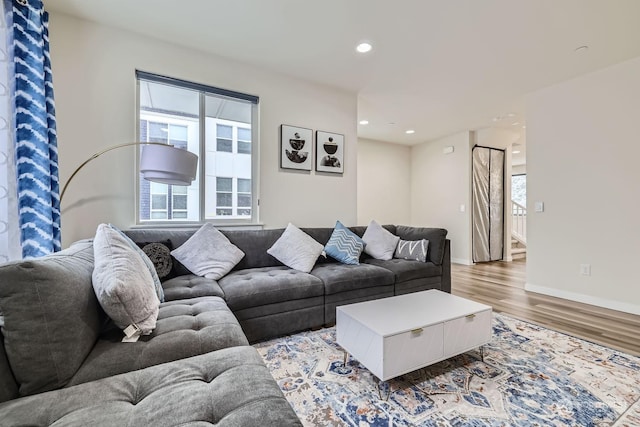 living room with light hardwood / wood-style floors