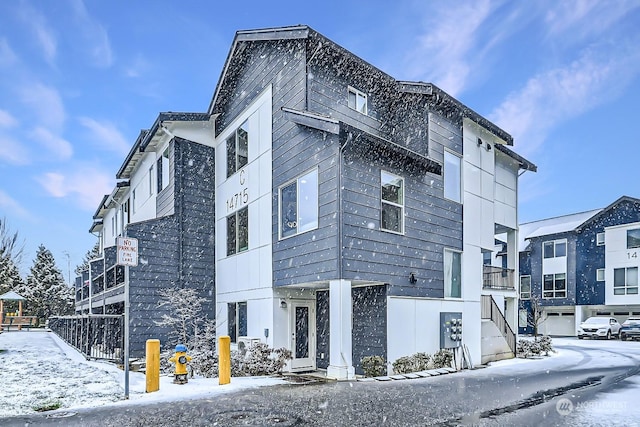 view of snow covered property