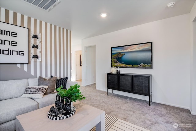 living room featuring light carpet