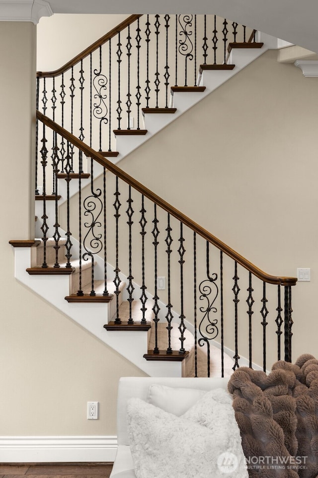 staircase with baseboards