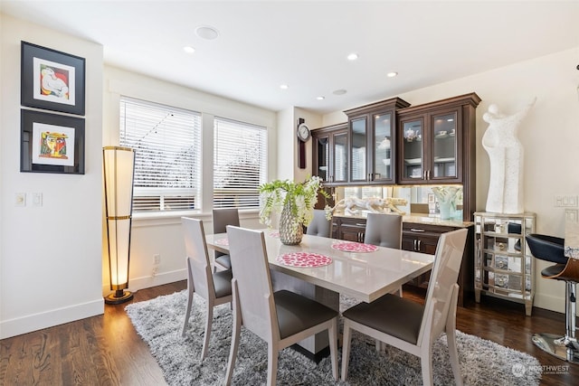 dining room featuring dark hardwood / wood-style flooring