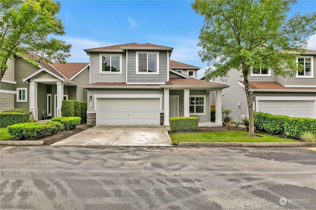 view of front of property with a garage