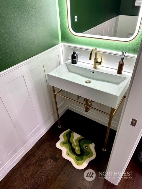 bathroom featuring hardwood / wood-style floors and sink