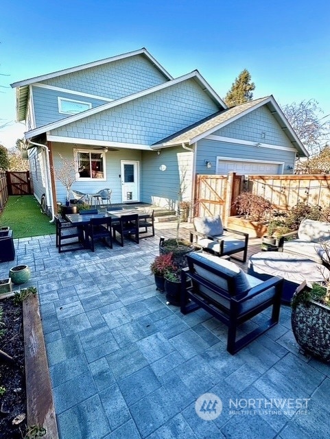 rear view of house with a patio