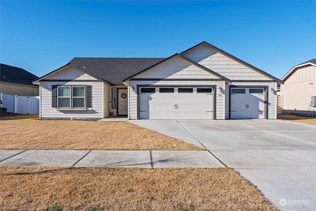 view of front facade featuring a garage and a front yard