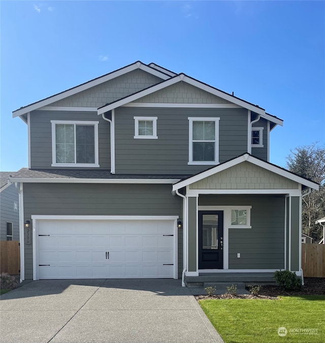 view of front of property featuring a garage